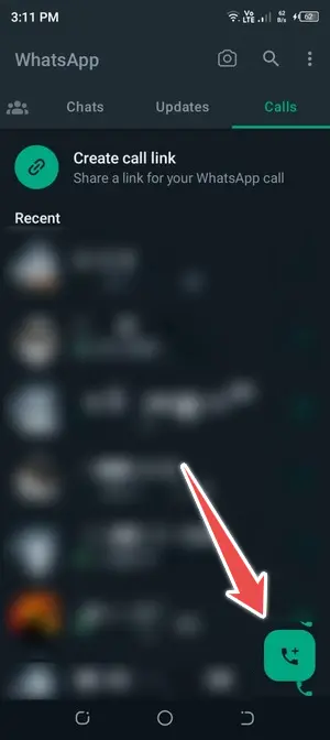 go to calls, click on + button - whatsapp conference call